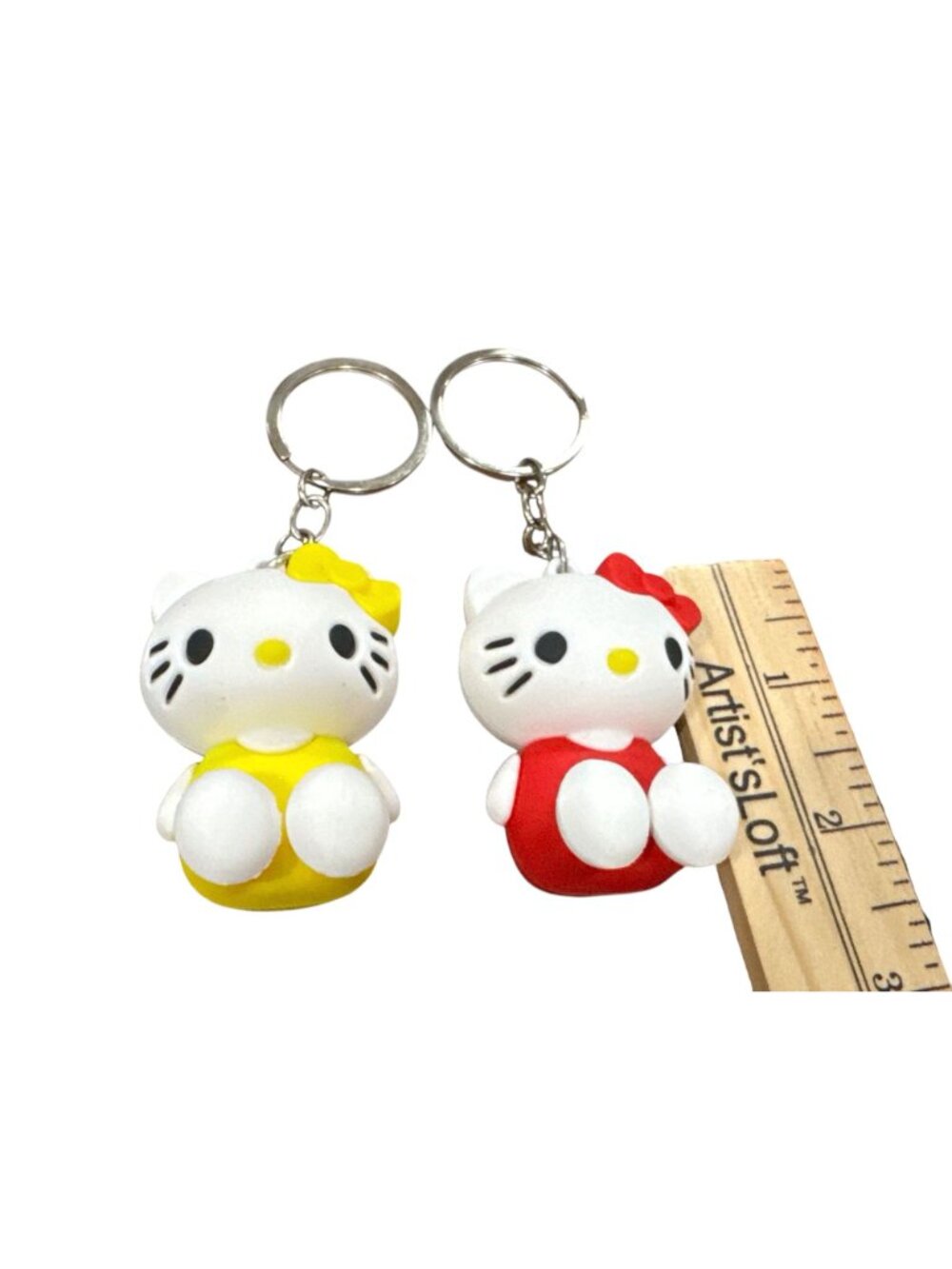 Hello Kitty Keychains Set Of 2 With Red & Yellow Outfits 3D Rubber Design 2 Inch - Picture 4 of 4
